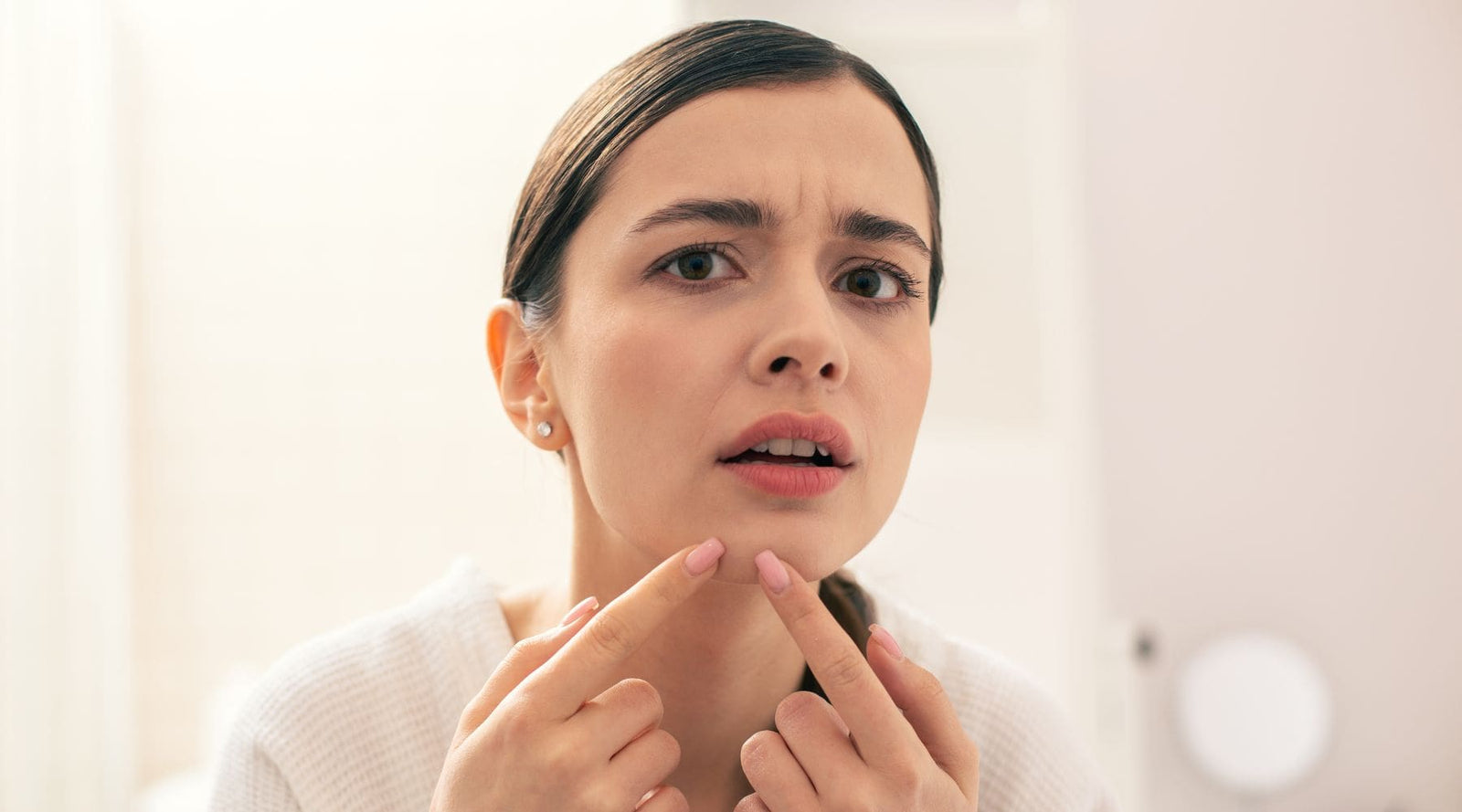 Woman fighting against acne with hydrojelly mask, the best solution