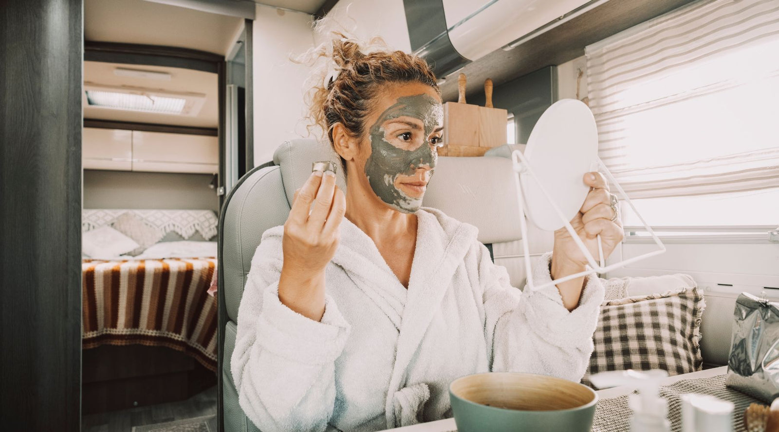 Woman adding face masks clay or jelly